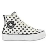 Championes Converse Chuck Taylor All Star Lift con plataforma, capellada de lona color blanco con estampado de lunares negros y logo de la marca en el lateral.