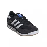 Championes adidas modelo SL 72 RS, de diseño retro con base negra, detalles en blanco en las icónicas tres tiras y el talón, y suela de goma dentada.