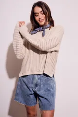 Sweater celeste de tejido de punto calado con lurex, de corte holgado y mangas largas.