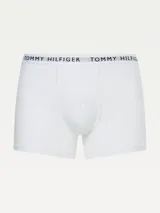 Pack de tres calzoncillos trunk blancos de Tommy Hilfiger, confeccionados en algodón y elastano, con cintura elástica con el logo de la marca.