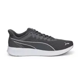 Championes Puma Transport Modern Running color gris, con detalles en blanco y suela blanca.