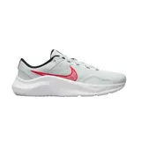Championes de entrenamiento Nike Legend Essential 3, color gris claro con logo lateral bordado en rojo y suela blanca.