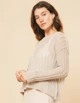 Sweater blanco de algodón con escote redondo, manga larga y calado en punto desagujado.