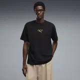 Remera Puma Graphics Stadium Relax, color negro, de manga corta y corte holgado. Presenta un pequeño estampado dorado en el centro del pecho con el logo y el nombre de la marca.