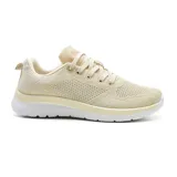 Championes deportivos American Sport color beige con detalles iridiscentes y suela blanca.