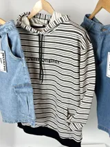 Canguro a rayas horizontales en negro y crudo, de algodón rústico.