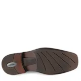 Zapato de vestir tipo mocasín color marrón oscuro, con diseño de costuras frontales y suela de goma negra.