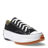 Championes Converse modelo Run Star Hike, de corte bajo, con capellada de lona negra, puntera de goma blanca y suela de plataforma dentada con detalle en color caramelo.