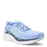 Championes New Balance Fresh Foam 680 V8, color celeste con detalles en amarillo y azul. Ideal para running.