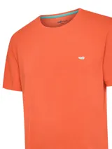 Remera de jersey de algodón orgánico color rosado, con cuello redondo, manga corta y detalle de parche con logo contrastante en el pecho de la marca RKF.