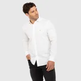 Camisa de algodón color blanco, de manga larga, con cuello camisero clásico y cierre frontal de botones. Cuenta con el logotipo de la marca bordado sutilmente en el pecho.