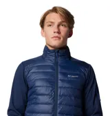 Chaqueta híbrida Columbia con panel frontal acolchado y mangas de tejido softshell liso. Cuenta con cierre frontal completo, cuello alto y bolsillos laterales con cierre. Diseño técnico con tecnología Omni-Shield repelente al agua y aislamiento térmico sintético.