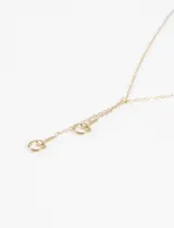 Collar dorado de acero quirúrgico hipoalergénico con dije de herradura.