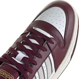 Championes Adidas Break Start color bordó con detalles en blanco y suela color crema. Confeccionados en cuero sintético con las tres tiras laterales en gamuza. Inspirados en el estilo retro del básquet.