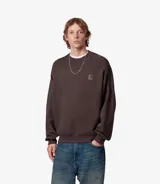 Buzo de cuello redondo Carhartt WIP modelo Vista Sweat, confeccionado en algodón pesado con efecto lavado. Presenta un corte holgado, puños y ruedo acanalados, y el logo de la marca bordado en el pecho.