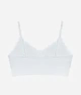 Soutien blanco de microfibra, estilo top alargado, con encaje en el escote, sin costuras, sin aro y con copas removibles.