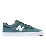 Championes de skate New Balance Numeric 306, color verde azulado con logo "N" blanco y detalles en rojo.