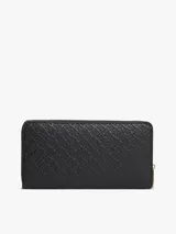 Billetera de poliuretano color negro con cierre de cremallera perimetral. Presenta un acabado texturizado con monograma TH en bajorrelieve, detalles metálicos dorados y logo de la marca en la parte frontal.