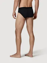 Kit de dos calzoncillos tipo slip para hombre, uno negro y uno gris, ambos con elástico en la cintura que lleva la marca tejida.