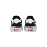 Championes Vans modelo Brooklyn Ls Platform, de diseño urbano con plataforma, confeccionados en lona y gamuza negra con la icónica banda lateral blanca y suela de goma blanca.