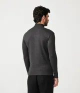 Buzo de corte slim con cuello alto y mangas largas, confeccionado en tejido de punto liso.