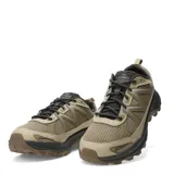 Championes de trail running Merrell modelo Tempo Exp, color beige con detalles en marrón oscuro y gris. Presentan una estructura de malla transpirable con refuerzos sintéticos, cordones oscuros y una suela robusta con relieve para mayor tracción.