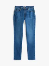 Jean ajustado de talle medio, color azul medio, con efecto desteñido en muslos y costuras, y efecto usado en la parte delantera. Presenta cierre de cremallera con botón y estilo de cinco bolsillos.