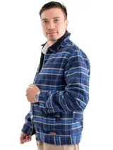 Campera con cierre confeccionada en lana con estampado tartán en tonos verde y beige, cuello clásico y bolsillos laterales.