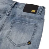 Jeans ajustados de mujer, tiro alto, color celeste claro con efecto desgastado y lavado. Presentan un diseño clásico de cinco bolsillos, cierre con broche de marca y parche de logo Oxford Cat en la pretina trasera.