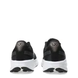 Championes de running New Balance modelo Fresh Foam 520, color negro con detalles en rosa dorado (logo 'N' y detalles en la parte trasera). Poseen entresuela blanca con tecnología Fresh Foam y suela exterior negra.