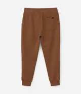 Pantalón de jogging masculino, color gris melange, confeccionado en algodón y poliéster. Presenta cintura elástica con cordón de ajuste y puños ajustados en los tobillos.