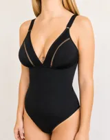 Body modelador y reductor de color negro, confeccionado en lycra. Presenta un diseño con escote en V profundo, detalles de red en las copas, breteles regulables y cierre con broches en la entrepierna.