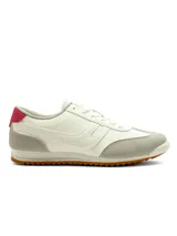 Championes deportivos Santa Barbara modelo Flair, en color amarillo con detalles en mostaza, plateado y blanco. Cuentan con cordones blancos, suela blanca y base de goma marrón.