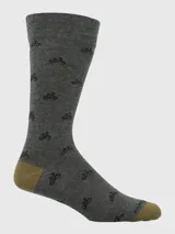 Calcetín de largo medio color gris oscuro con estampado repetitivo de bicicletas en negro. El puño es de tejido acanalado y el talón y la punta son reforzados en color verde oliva/tostado.