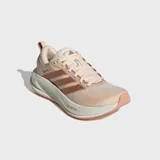 Championes de running Adidas Supernova Ease 2, color salmón con detalles en tonos tostados y entresuela blanca.