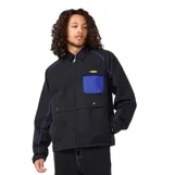Campera Rip Curl modelo Archive Super Computer, color negro con costuras en contraste azul, bolsillo en el pecho de color azul y cierre frontal completo.