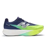 Championes de running New Balance FuelCell SC Elite v3, color azul marino con detalles en verde lima y plateado. Presentan una entresuela gruesa blanca con degradado a verde lima y tecnología FuelCell.
