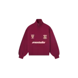 Buzo half zip Eme Studios Peak Burgundy, de color bordó con cuello alto y cierre frontal parcial. Cuenta con bordados en el pecho y el nombre de la marca estampado en el centro.
