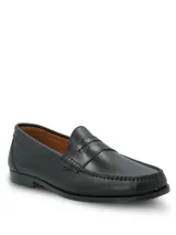 Zapato mocasín Cazzoli de cuero color negro, de diseño clásico con empeine estructurado y costuras visibles en el contorno de la puntera.