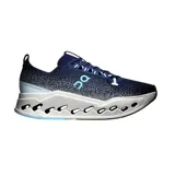Championes de running On Running modelo Cloudsurfer Max, color azul marino con entresuela blanca gruesa con perforaciones y detalles en celeste.