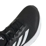 Championes Adidas Response color negro con detalles blancos, ideales para running.