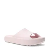 Chanclas Puma modelo Shibui Cat, de diseño minimalista y una sola pieza, color rosado, con suela de plataforma y logo de la marca grabado en el lateral.