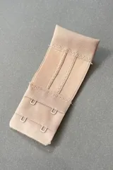 Extensor de contorno de soutien blanco, con dos ganchos.