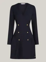 Vestido corto azul marino de viscosa, con escote en V, mangas largas y cierre cruzado con doble botonadura dorada.