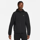 Campera Nike Tech Fleece con cierre frontal completo, capucha integrada y bolsillos laterales con cierre. Presenta diseño técnico con costuras características y logo de la marca en el pecho.