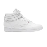 Championes Reebok Freestyle Hi de caña alta, color blanco, con ajuste de velcro en el tobillo y logo de la marca en el lateral.