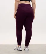 Calza legging deportiva de poliamida color marrón, con cintura alta de 10 cm y diseño ajustado al cuerpo.