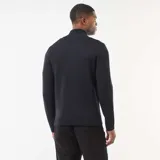 Sweater negro de punto grueso con cuello chimenea y cierre parcial con cremallera. Presenta hombros con costura marcada y puños y cintura acanalados.