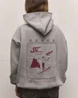 Canguro gris con capucha, de corte oversize y estampado en la espalda con la frase "Ski can be fun sometimes (with a cocktail)".