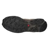 Championes Salomon modelo XT-6, diseñados para uso urbano y deportivo. Presentan una combinación de tonos marrones y detalles en crema, con estructura de malla y refuerzos de TPU. Incluyen sistema de cordones rápidos y suela técnica de alto rendimiento.